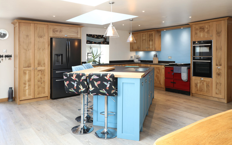 Panoramic kitchen with island in centre