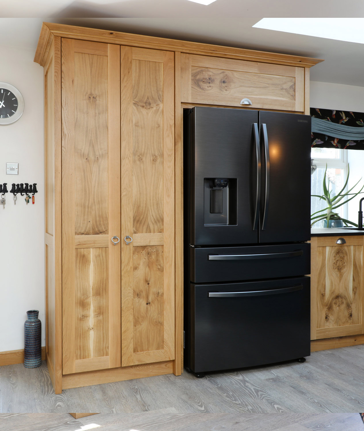 Character oak cupboards with integrated american style fridge